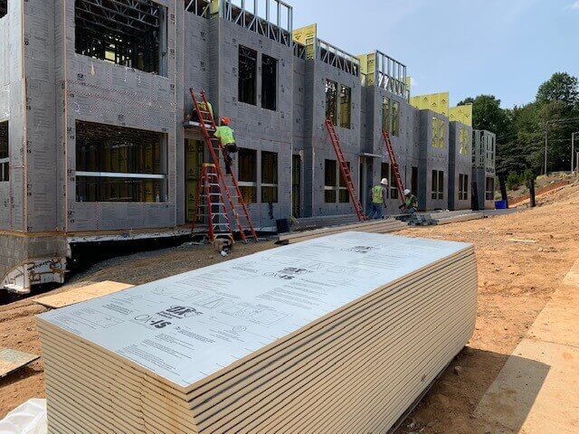 Construction site with insulation laying outside