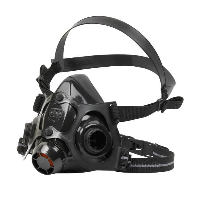 A black respirator mask with breathing ports and straps to go around the head and neck.