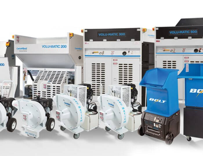 4 large, white Volu-Matic machines and 4 smaller, white Vac-Matic and 2 blue Bolt machines in front.
