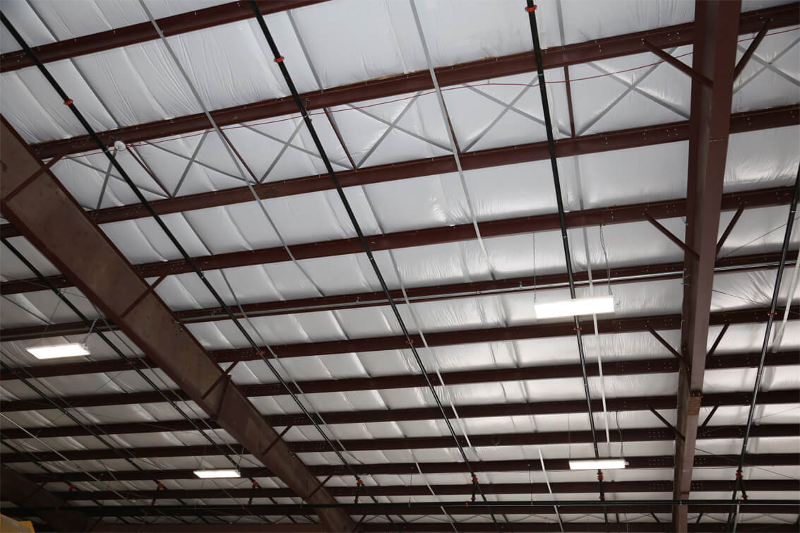 Wide shot of ceiling metal building insulation