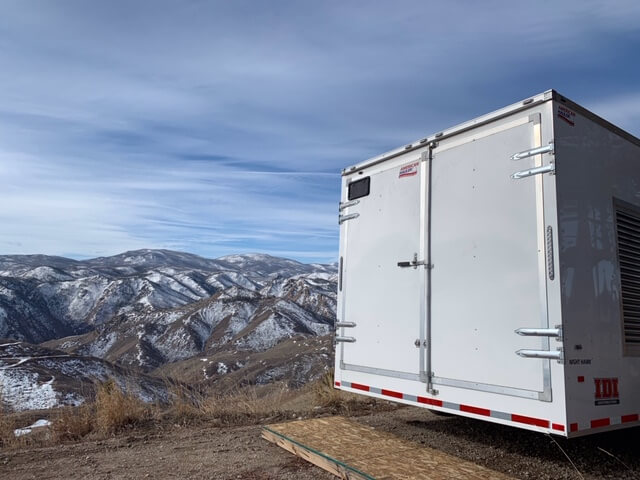 IDI insulation rig near mountain range