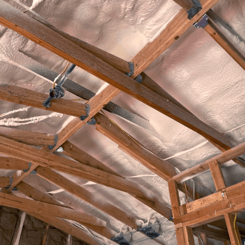 Unfinished ceiling beams in a wooden home