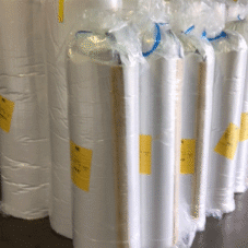 several rolls of Naima 202-96 fiberglass basement blanket insulation