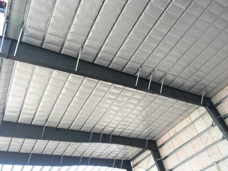 Long Tab Banded insulation inside metal building