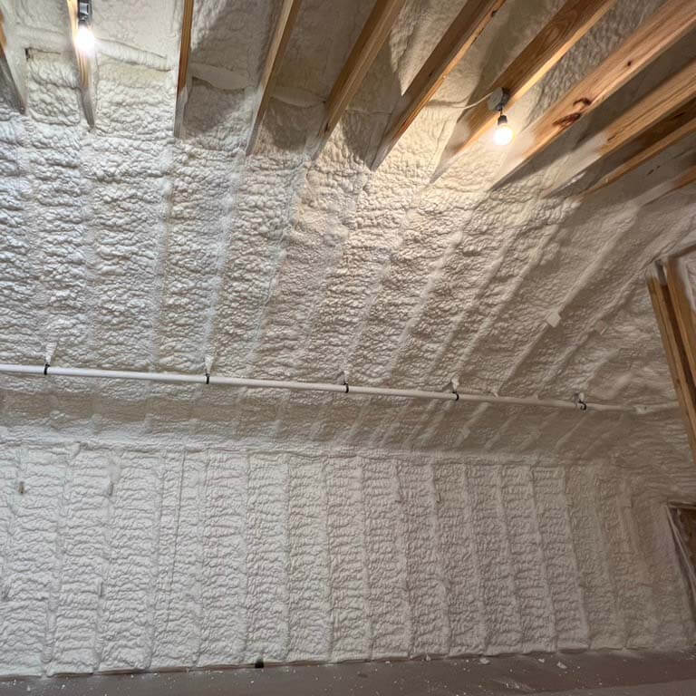 wall and ceiling. covered in spray foam