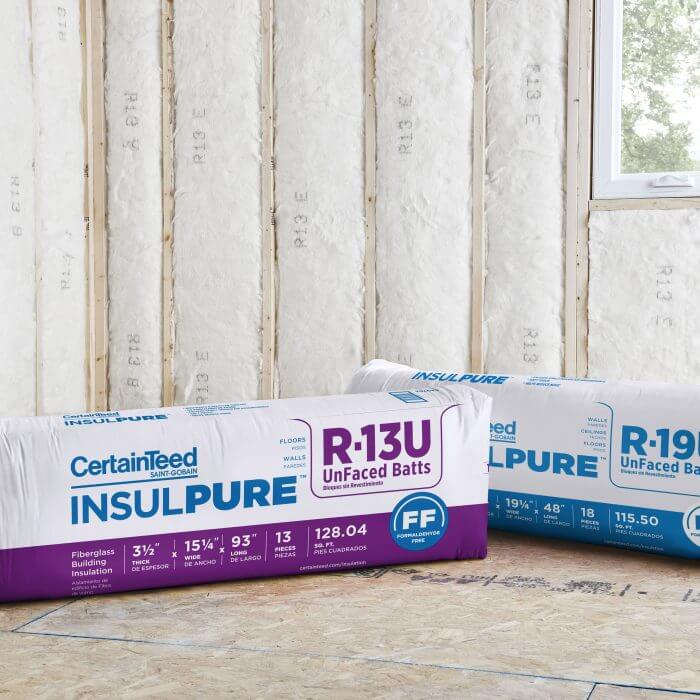 2 packages of CertainTeed insulpure against Wide exposed wall with insulation