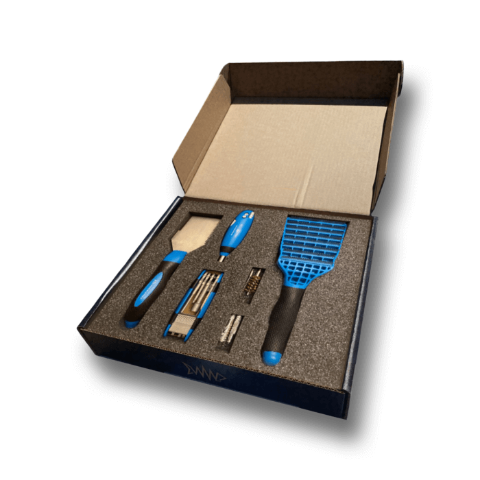 An open box with several blue and black insulation equipment parts in it.