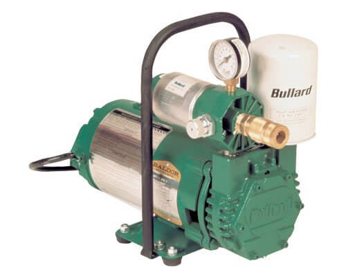 Green bullard electric driven pump for spray insulation close-up view