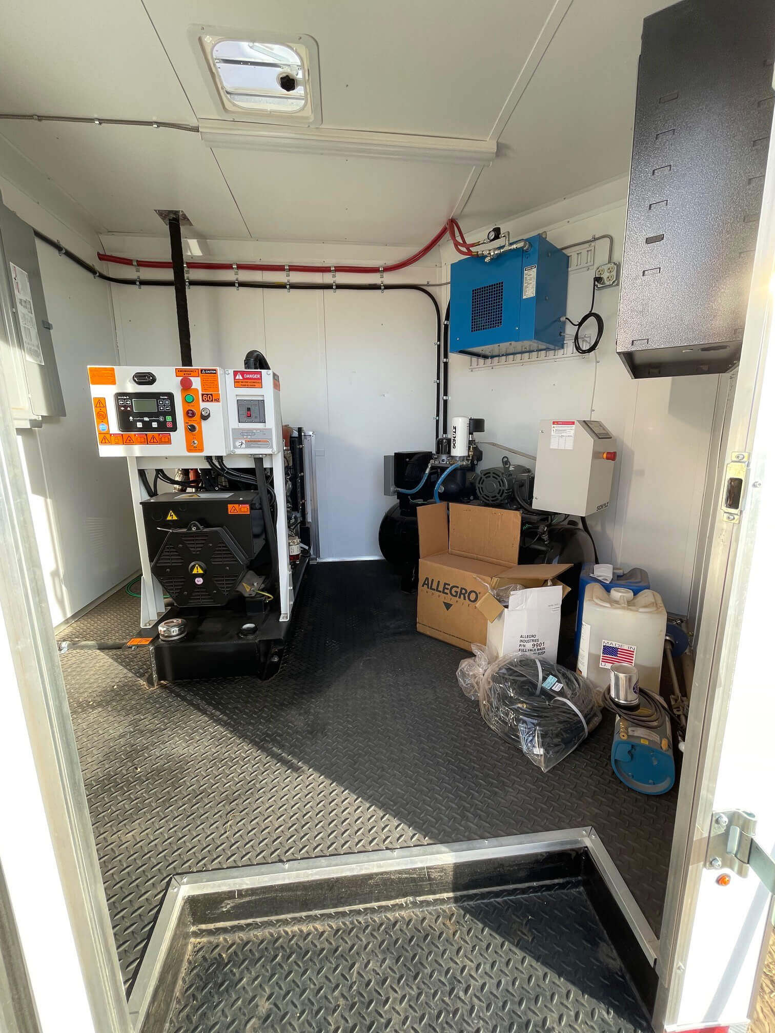 Spray foam equipment inside trailer of used rig for sale