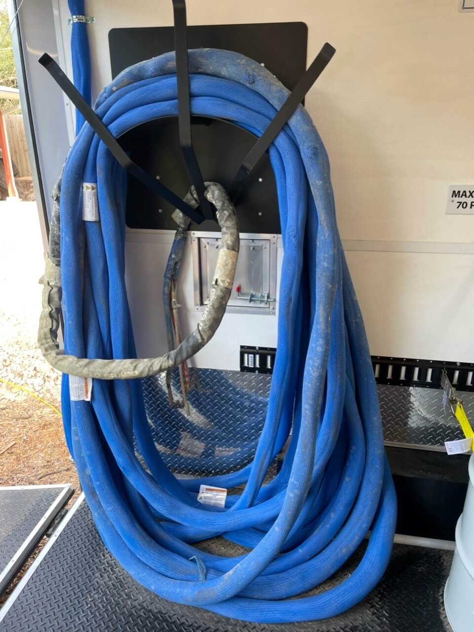 used hose on a hose rack